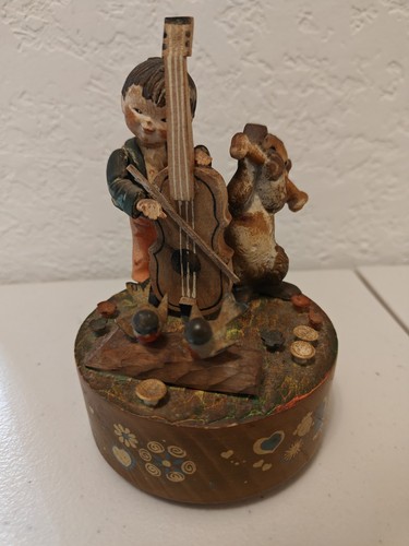 Anri music box - ragazzo, suona
